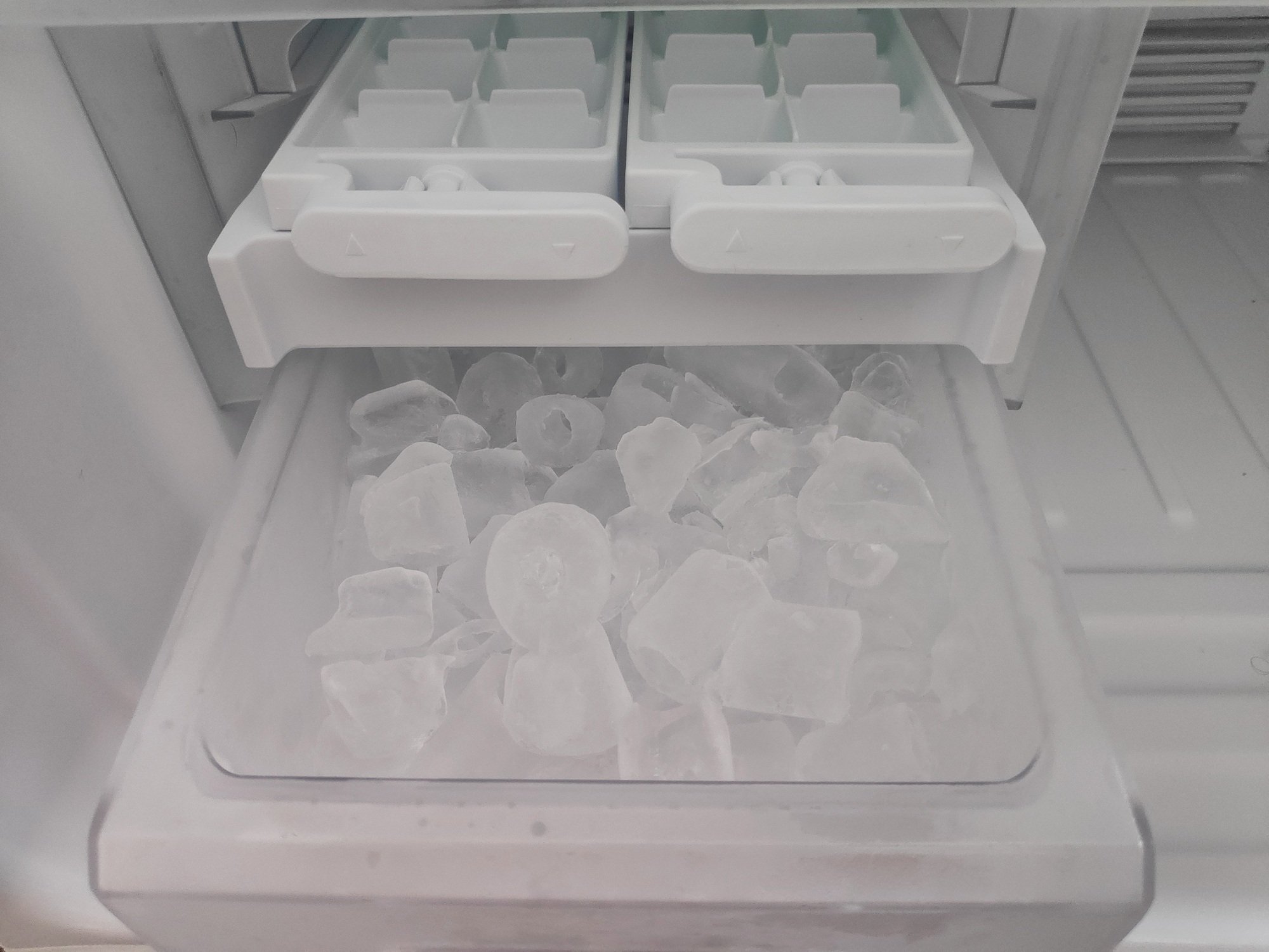 Ice maker container in the refrigerator.